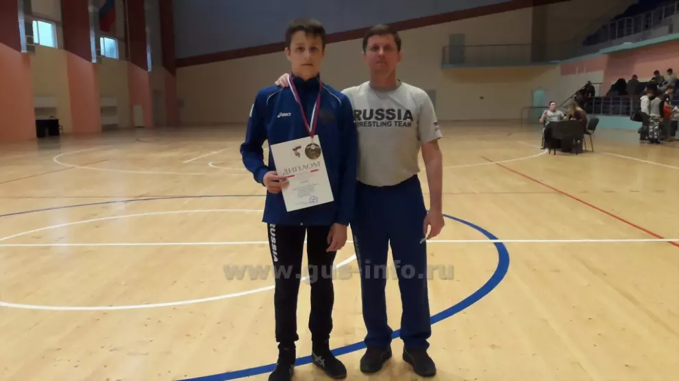 Золотая медаль Гусев...